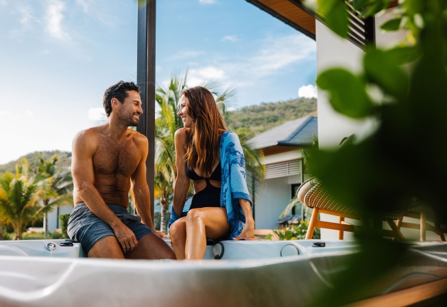 PI Beach Front Couple In Hot Tub Lifestyle July2025
