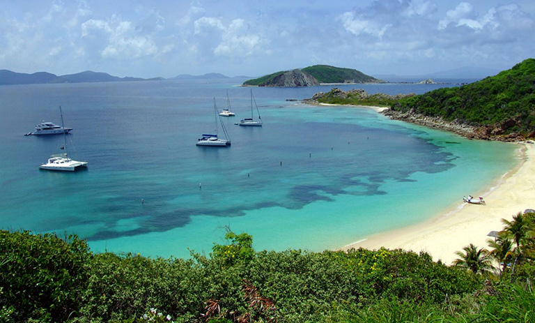 Image of Peter Island bay with catamarans.